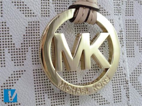 authinic vs fake michael kors hamilton|michael kors real logo.